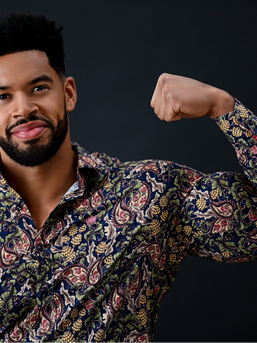 Athletic Bodybuilder in the best muscle-fit shirt made for bigger muscles
