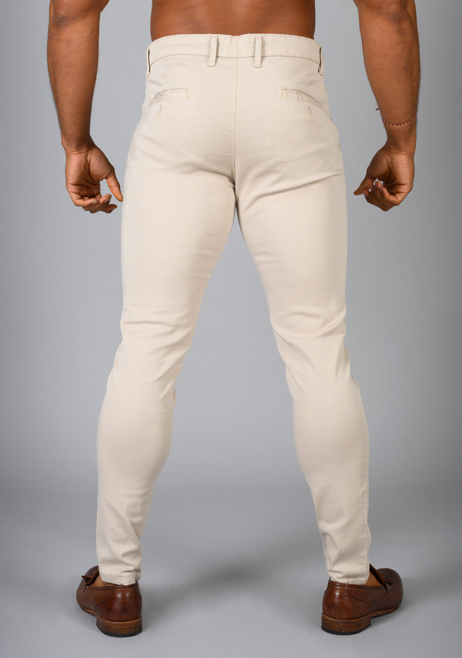 Oxcloth Beige muscle fit chinos offering a perfect blend of comfort and style for well-built physiques, with a contoured waist and athletic fit design for an on-trend appearance.