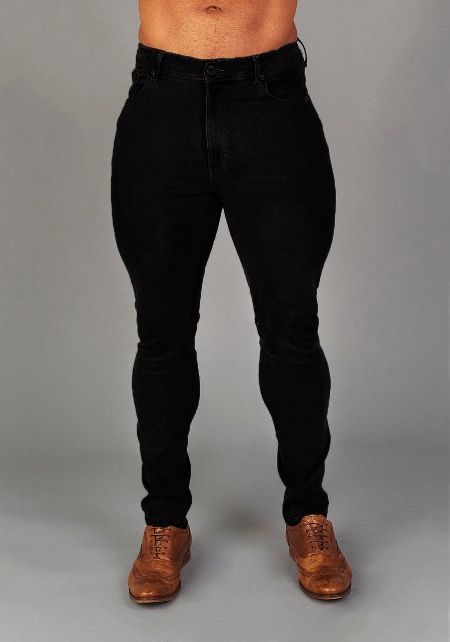 Black Athletic Fit Jeans by Oxcloth, tailored for muscular physiques, offering comfort and flexibility. Perfect combination of style and function for those seeking muscle fit jeans.