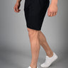 Comfortable navy blue muscle fit shorts with an adaptive muscle fit design for enhanced movement and durability, ideal for exercise and casual wear.
