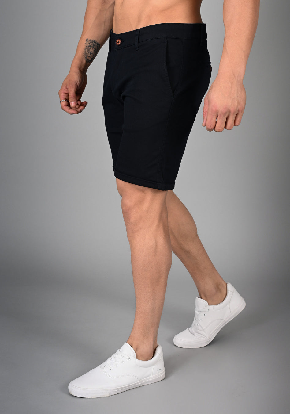 Comfortable navy blue muscle fit shorts with an adaptive muscle fit design for enhanced movement and durability, ideal for exercise and casual wear.