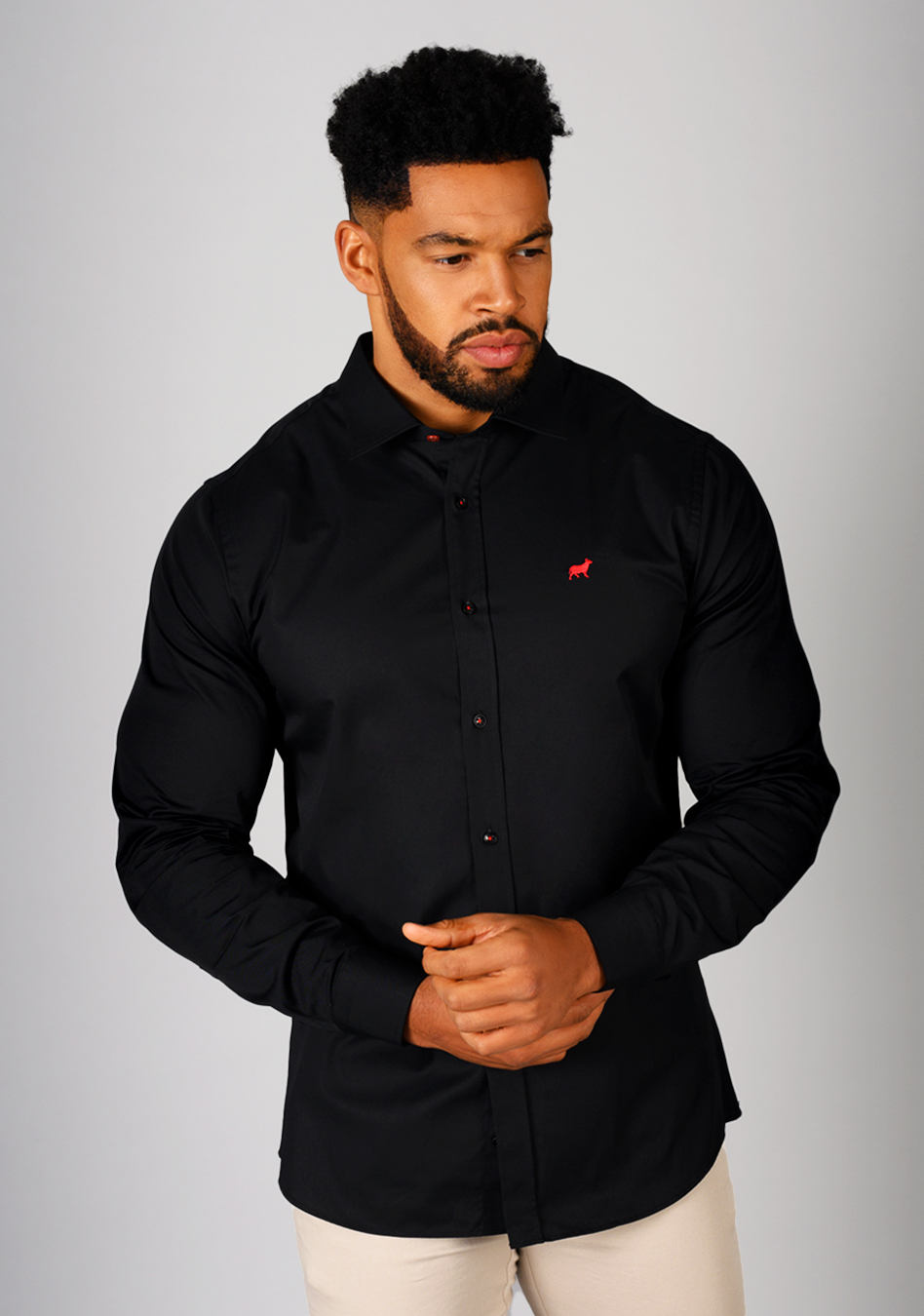Black Stretch muscle fit on an athletically built model, showcasing the athletic fit design that enhances physique, with stretch fabric for comfort and mobility