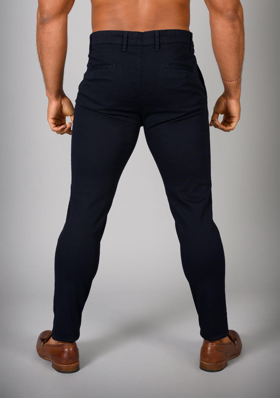 Oxcloth Dark Blue muscle fit chinos offering a perfect blend of comfort and style for well-built physiques, with a contoured waist and athletic fit design for an on-trend appearance.