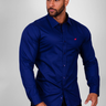 Deep blue muscle fit shirt on an athletically built model, showcasing the athletic fit design that enhances physique, with stretch fabric for comfort and mobility