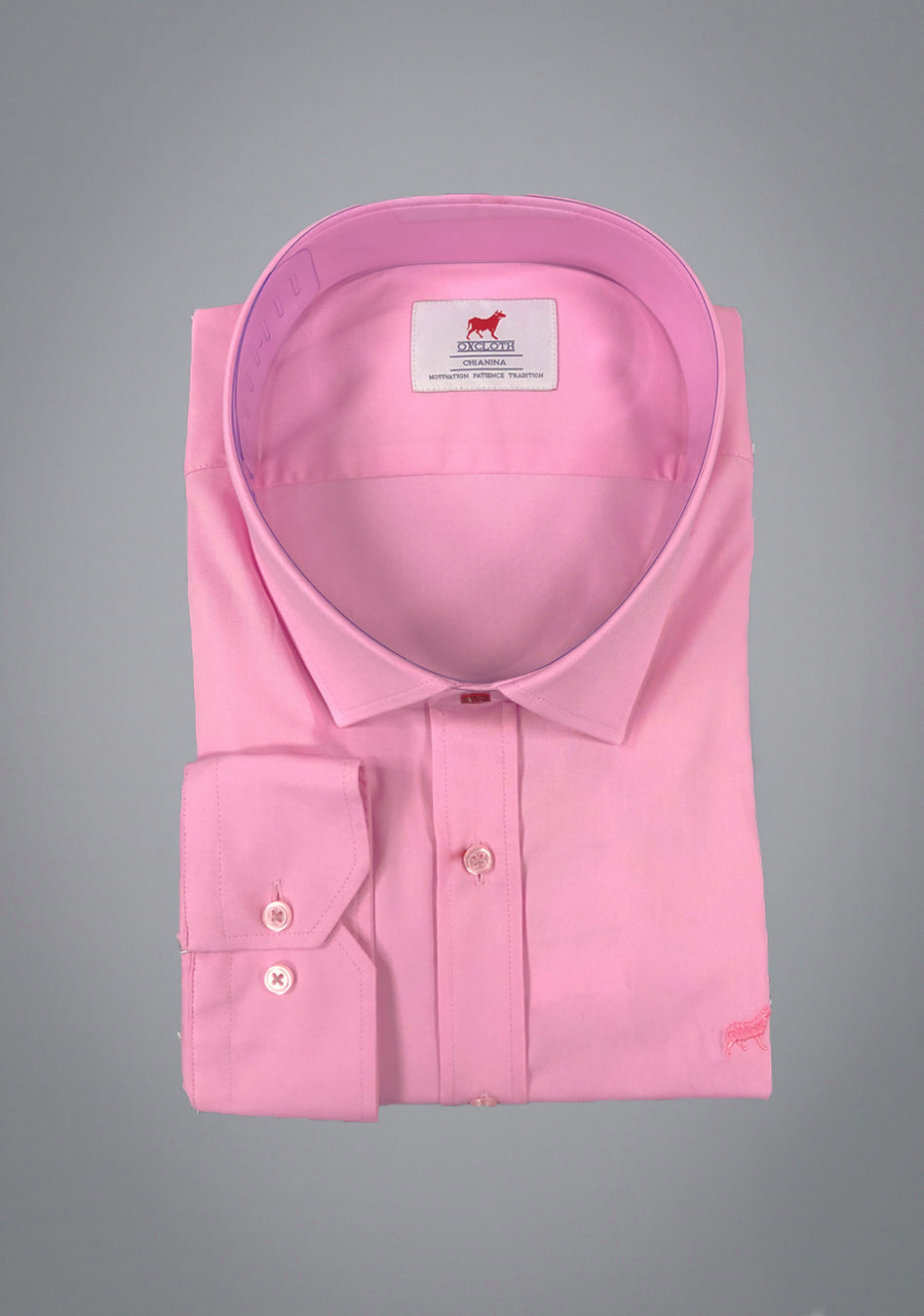 Pink muscle fit shirt on an athletically built model, showcasing the athletic fit design that enhances physique, with stretch fabric for comfort and mobility